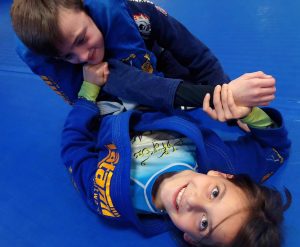 Ava triangle choking Ryder 5 Rings Jiu Jitsu Sheffield BJJ